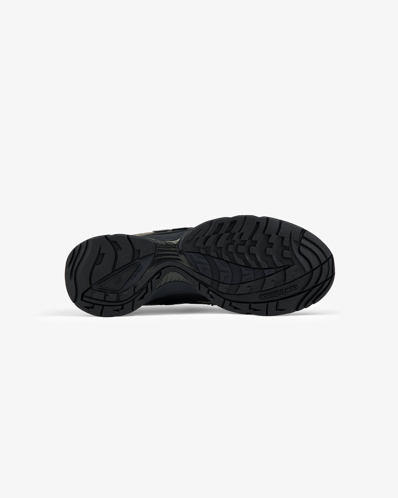 ALD / New Balance RC56 black athletic shoe outsole with textured tread pattern on a plain white background.