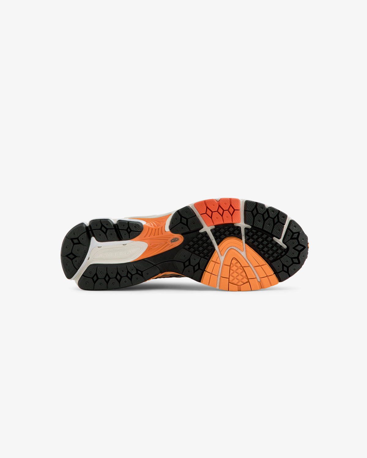 Bottom view of the ALD / New Balance 860v2 sole with black, orange, and beige tread on a white background.