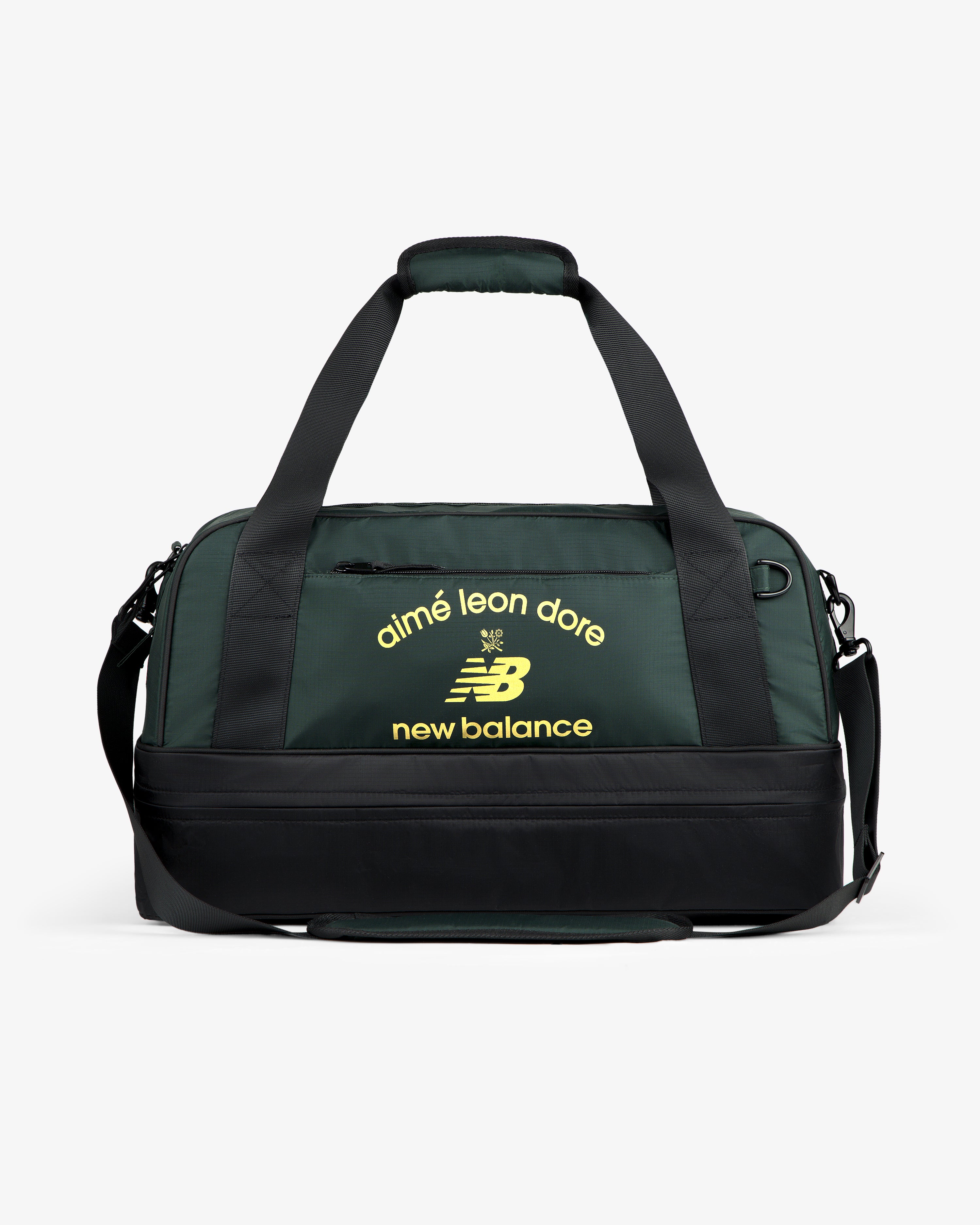 ALD / New Balance Travel Duffle Bag in dark green and black with yellow logos on the front.