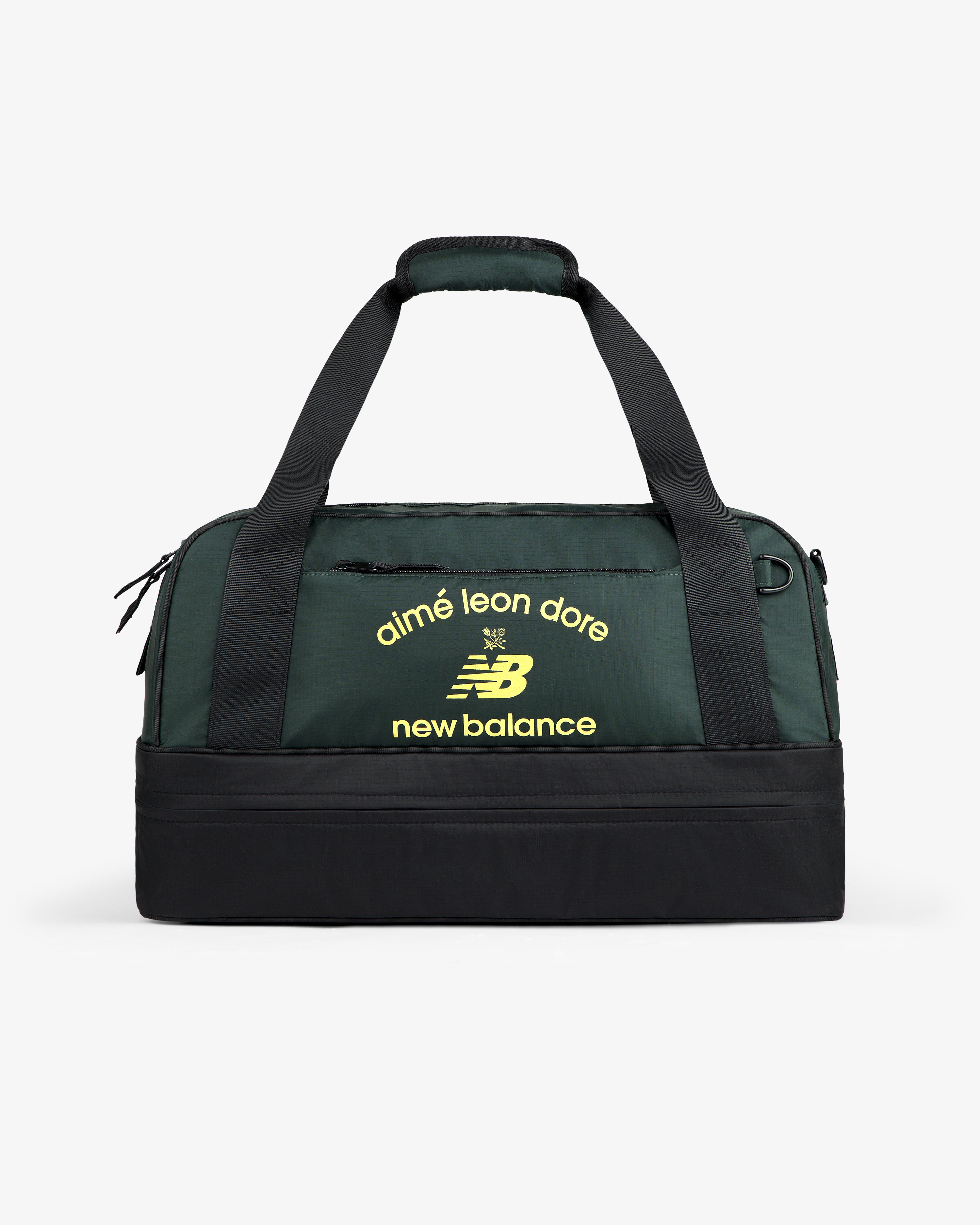 The ALD / New Balance Travel Duffle Bag is dark green and black with yellow logos on the front.