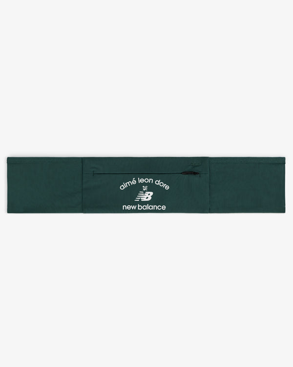 The ALD / New Balance Performance Running Belt is dark green with white logos on the front.