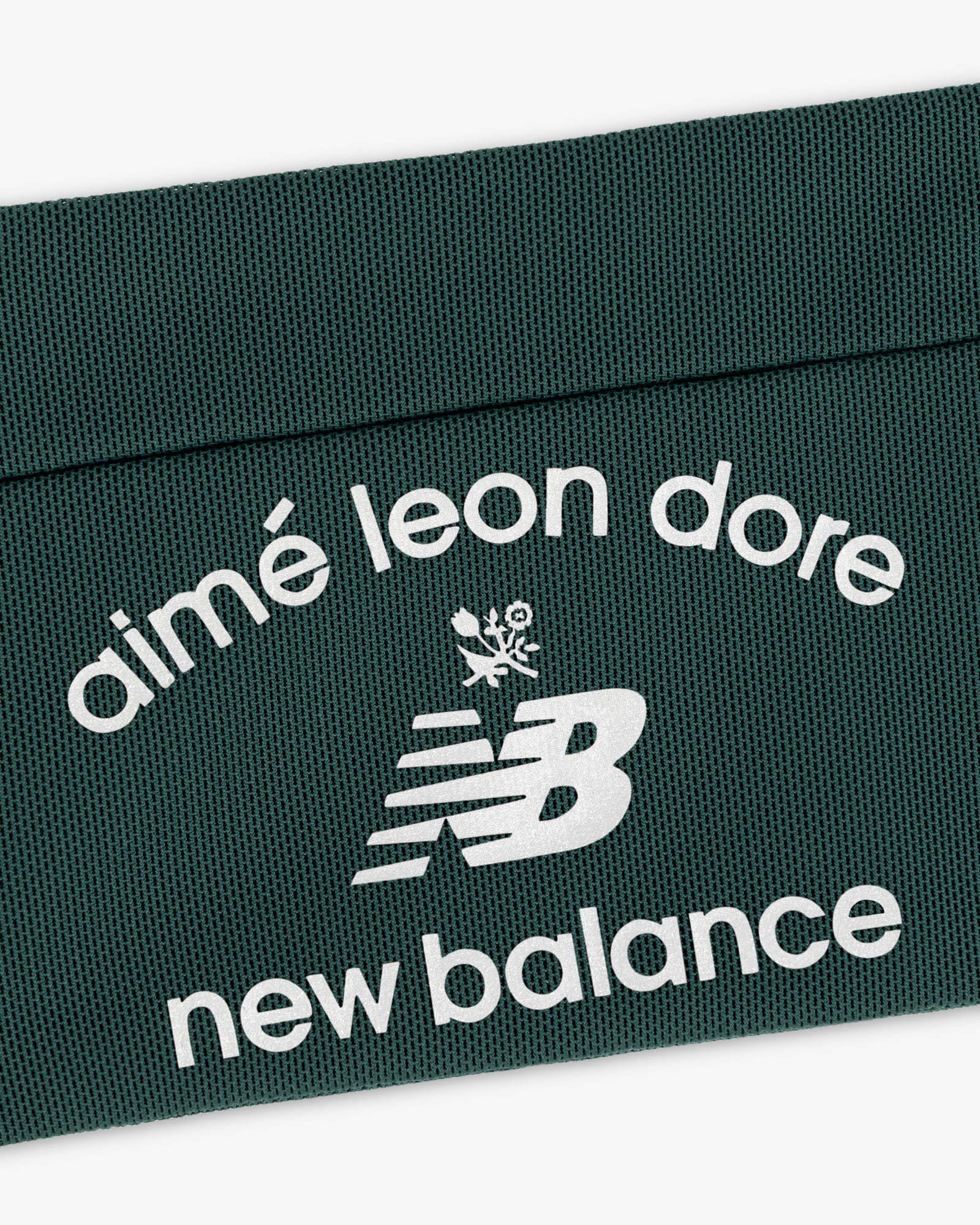 Dark green ALD / New Balance Performance Running Belt with white text and stylized NB leaf logo.