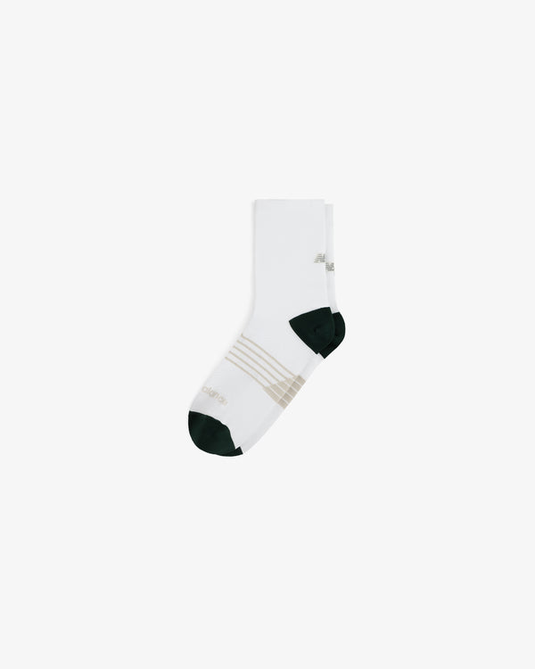 ALD / New Balance Running Crew Sock in white with beige stripes and dark green toe and heel on white background.