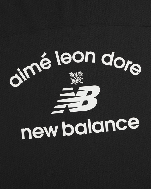 ALD / New Balance Full-Zip Warmup Hoodie: White text and NB logo with floral graphic on black background.