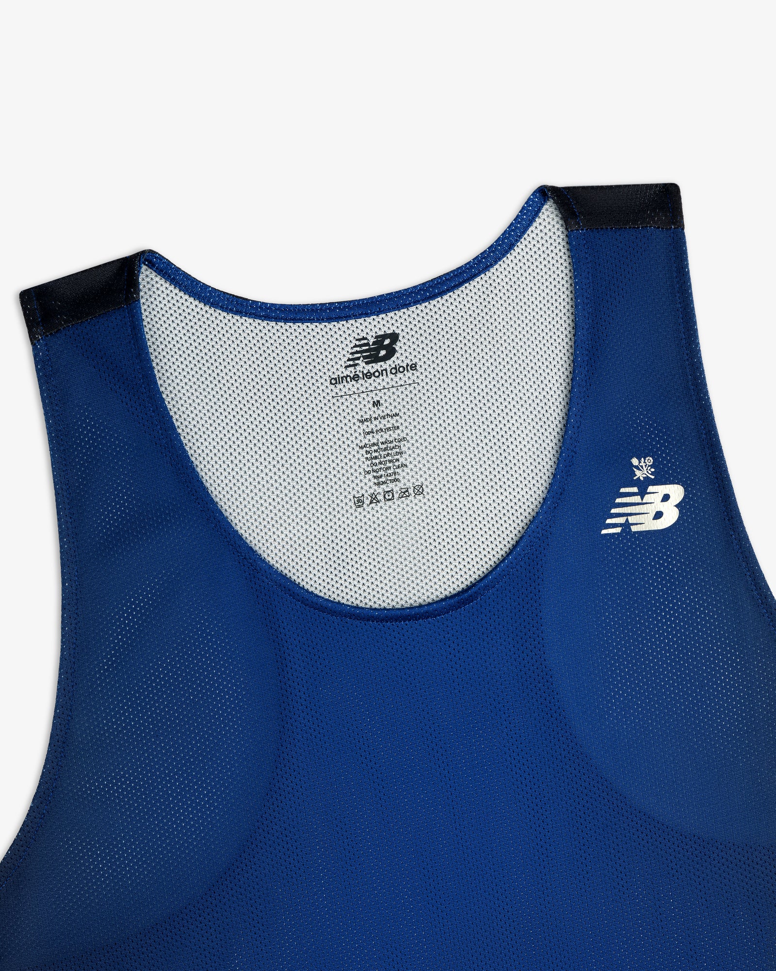 ALD / New Balance Running Gradient Singlet in blue with black shoulder trim and white logo, shown front flat.