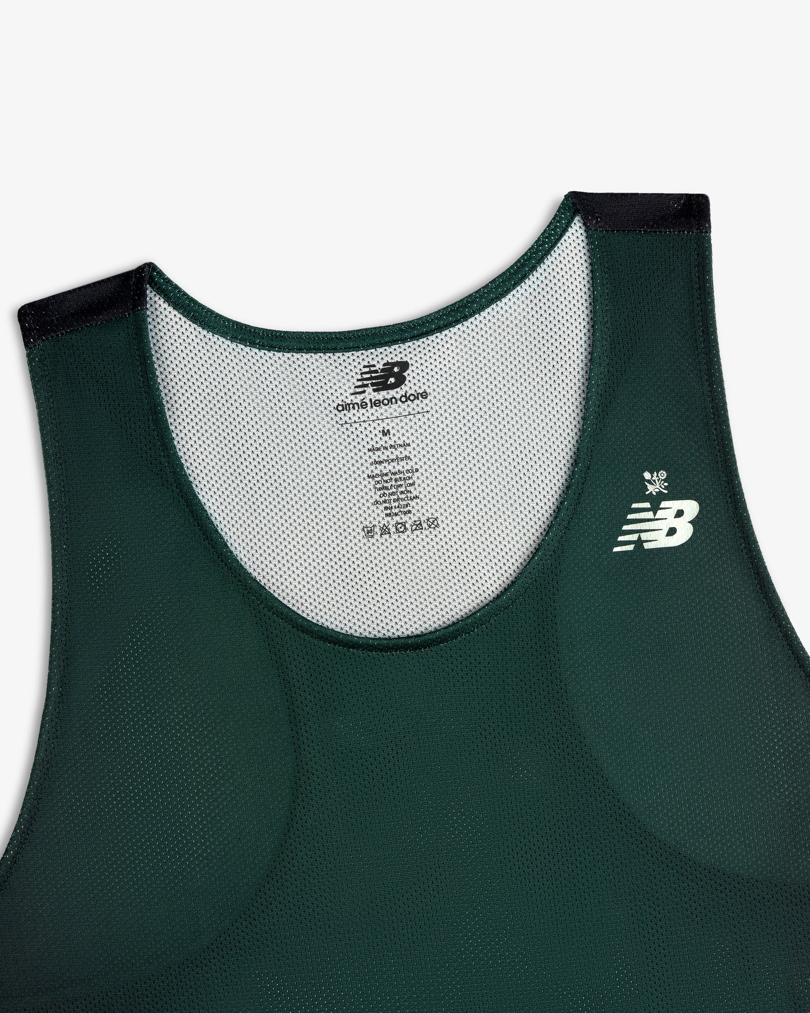 ALD / New Balance Running Gradient Singlet in dark green with white chest logo, shown on white background.