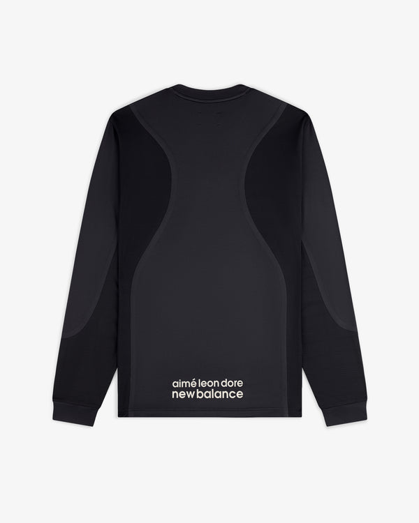 ALD / New Balance Performance Long-Sleeve Tee features curved panel designs and logo text on the lower back.