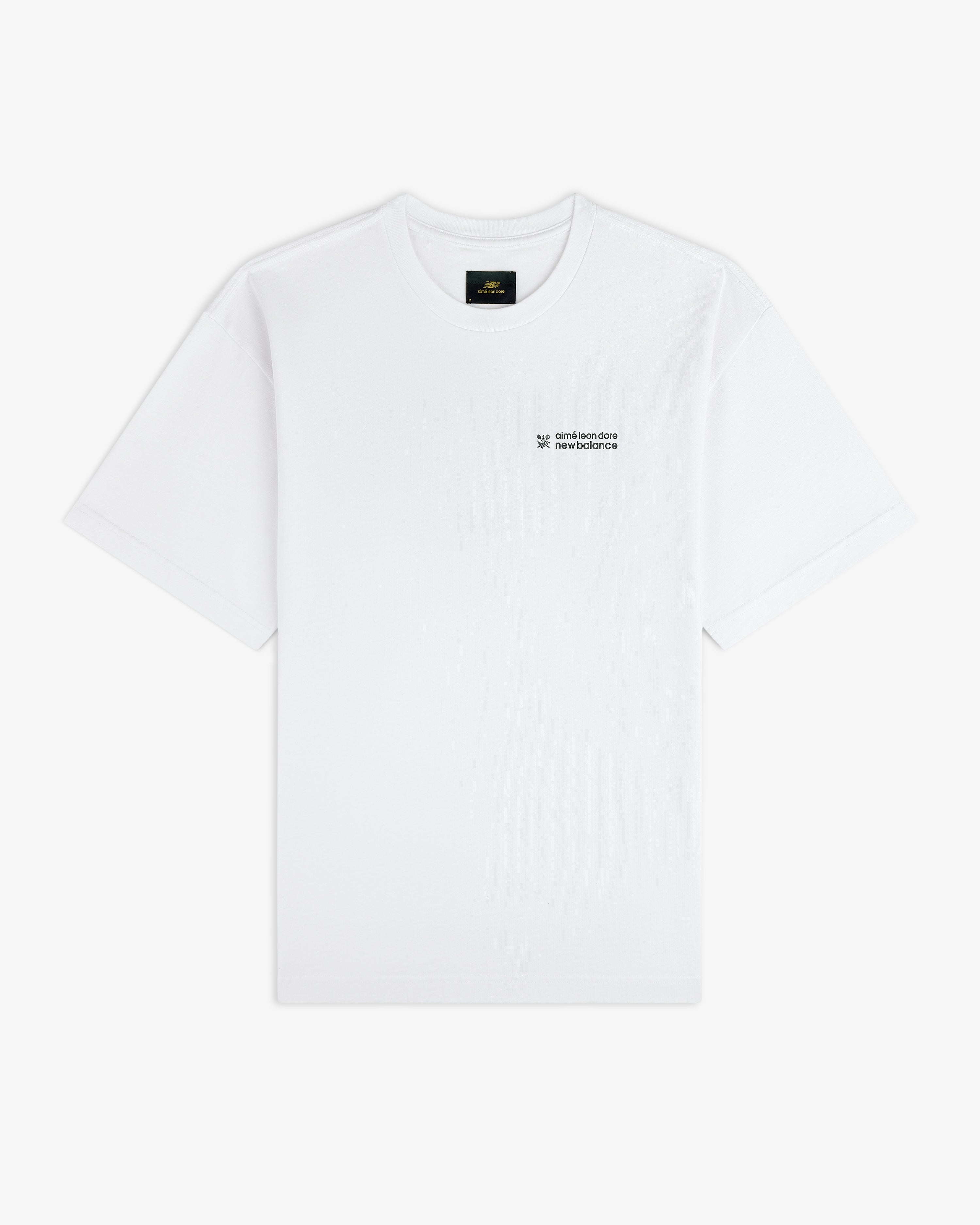 ALD / New Balance Running Bib Tee in white with small black chest text, shown on a plain white background.