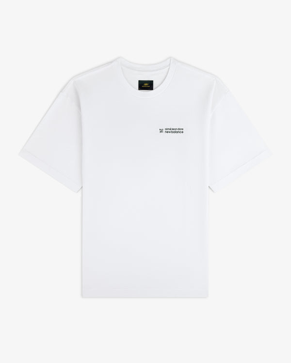 ALD / New Balance Running Bib Tee in white with small black chest text, shown on a plain white background.