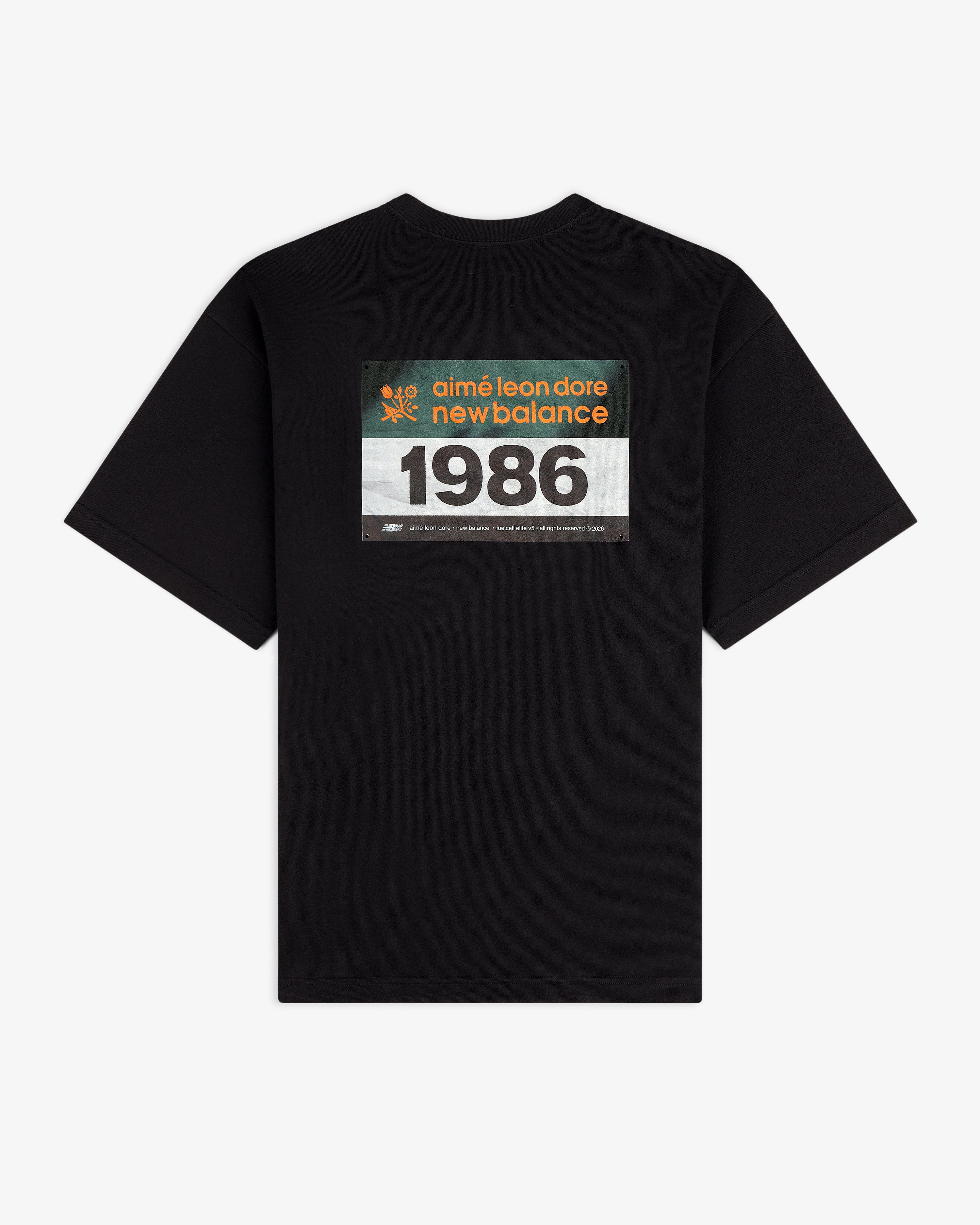 ALD / New Balance Running Bib Tee in black with rectangular "aimé leon dore new balance 1986" graphic on back.