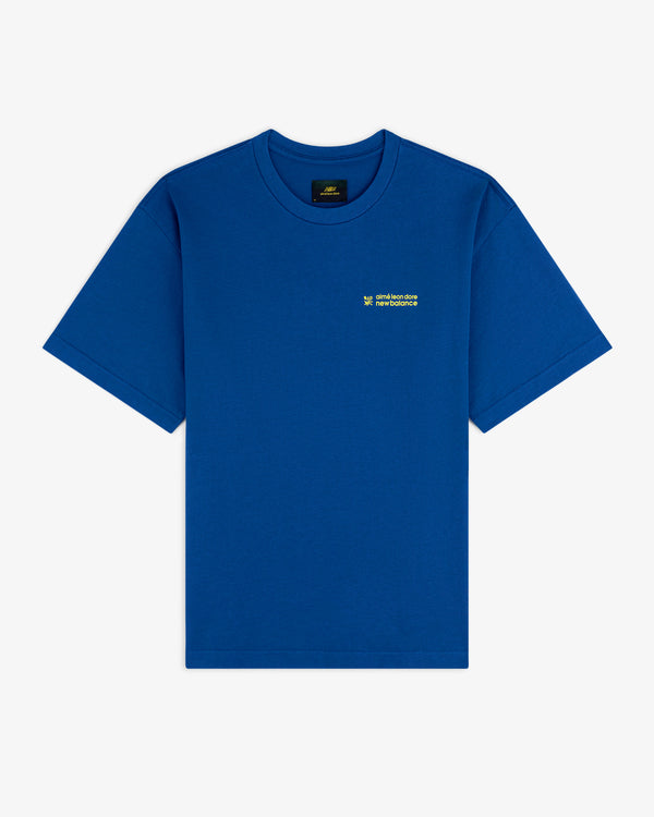ALD / New Balance Running Bib Tee, blue with small yellow text on left chest, shown on white background.