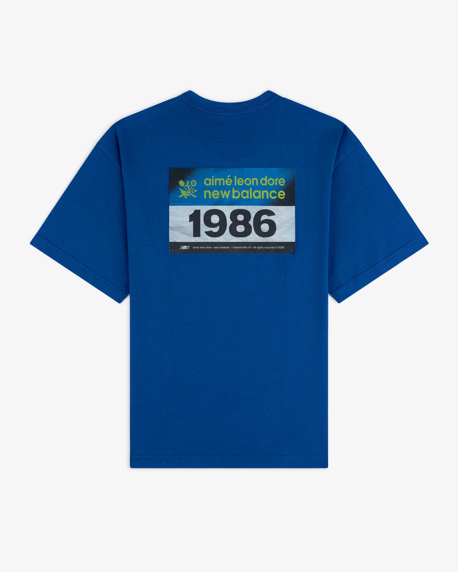 Blue ALD / New Balance Running Bib Tee with "1986" boldly printed on the back.