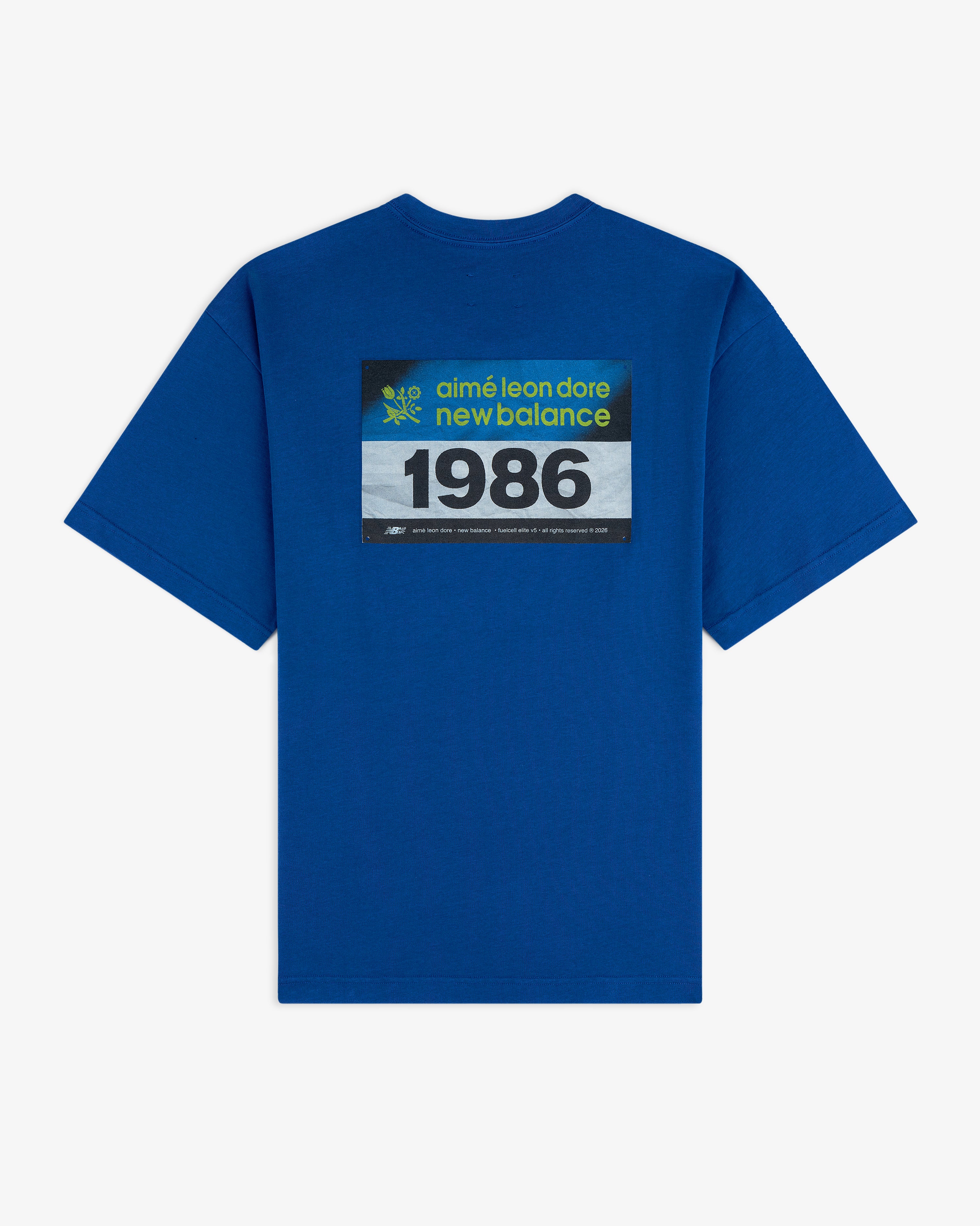 Blue ALD / New Balance Running Bib Tee with "1986" boldly printed on the back.