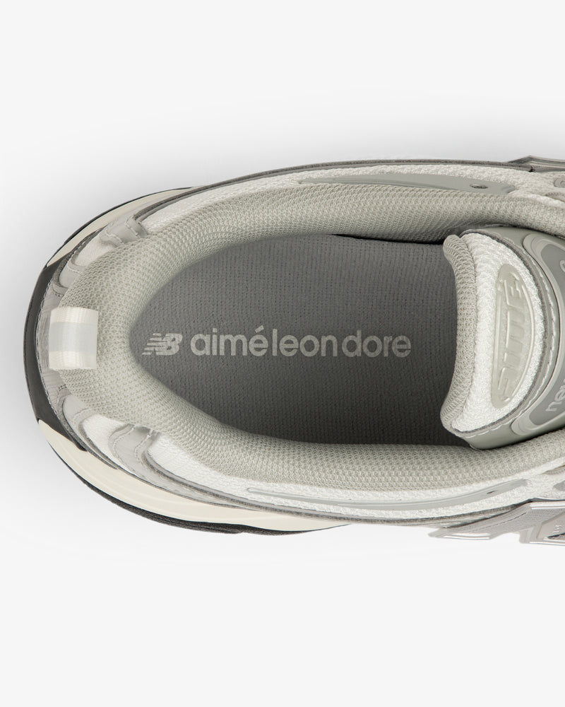Top view of the ALD / New Balance RC56 in grey showing NB aimé leon dore text on the insole.