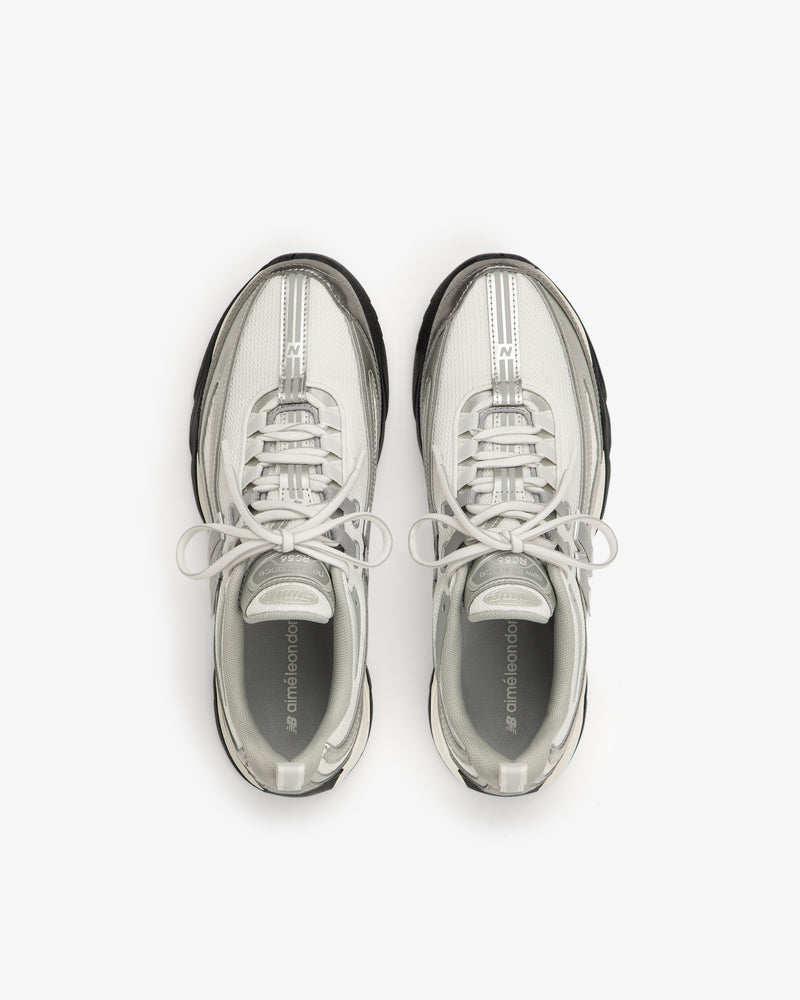 ALD / New Balance RC56 white sneakers with gray accents, top view on a plain white background.