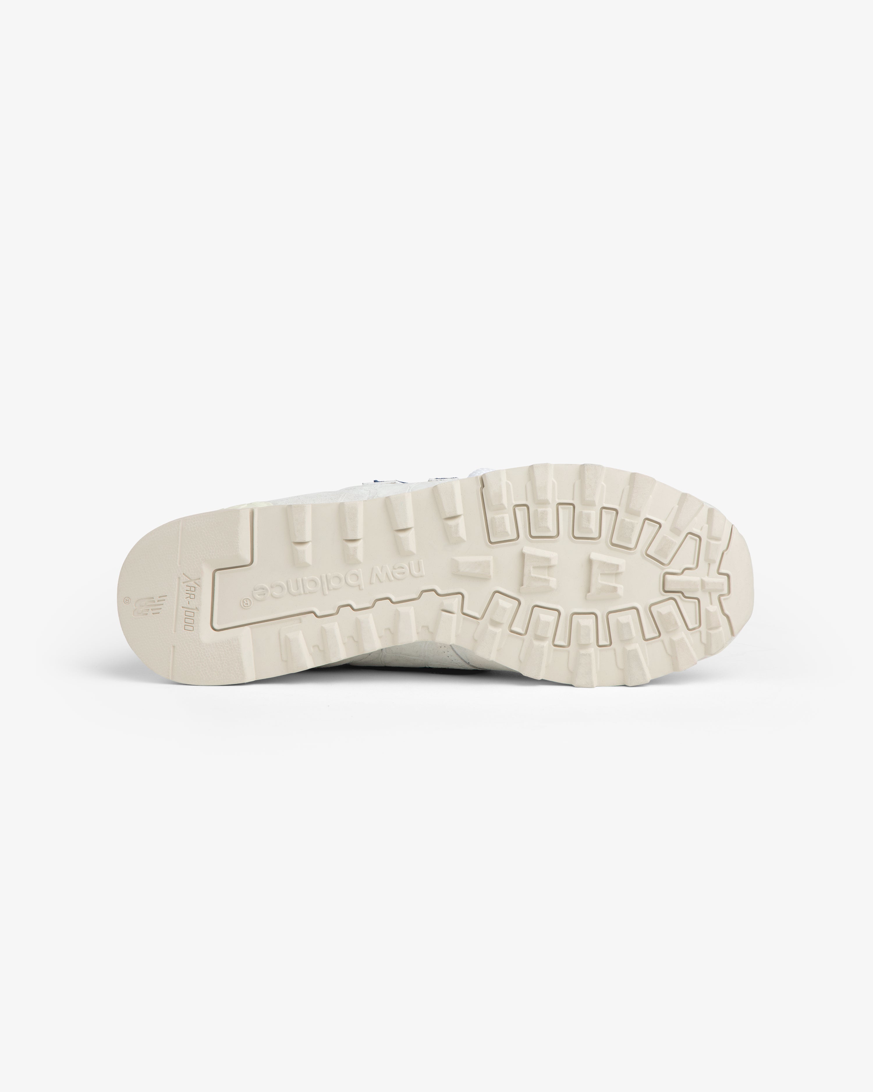 New Balance Made in USA 1300 sole shows tread pattern and logo on a white background.