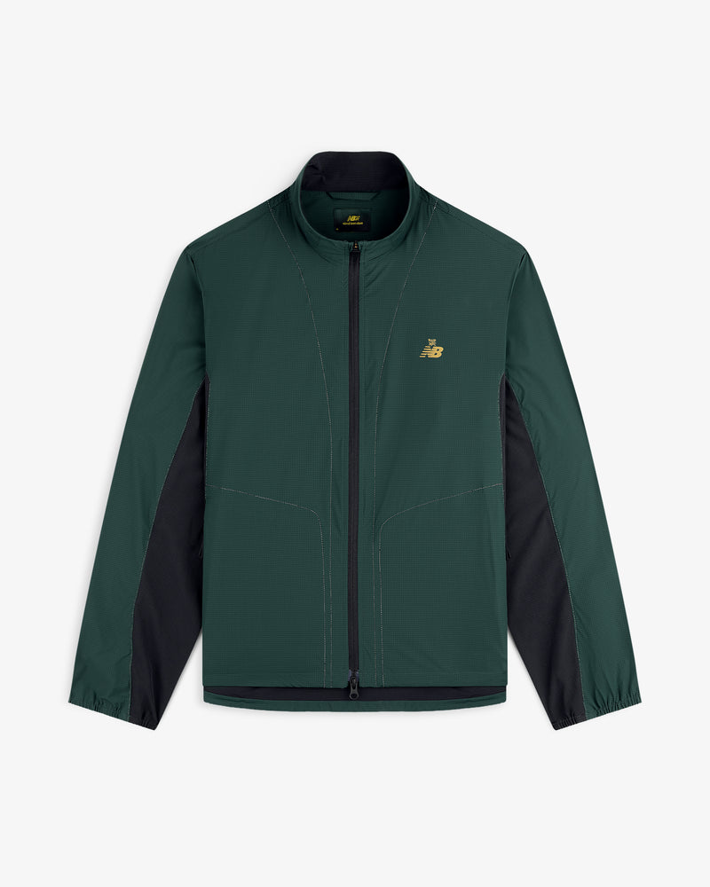 Dark green & black ALD/New Balance Performance Nylon Jacket with long sleeves & gold logo on the chest.