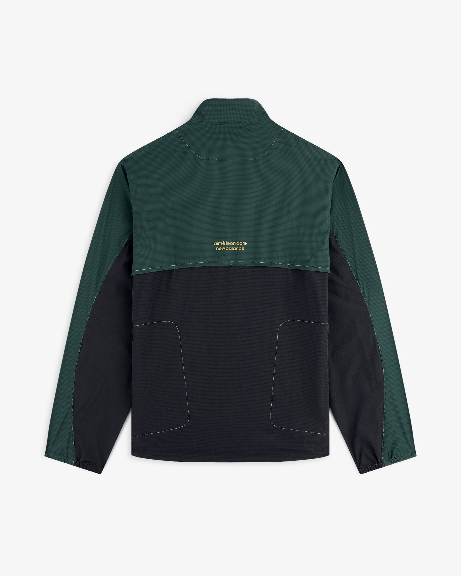 ALD / New Balance Performance Nylon Jacket in green and black with yellow back text, long sleeves, and high collar.