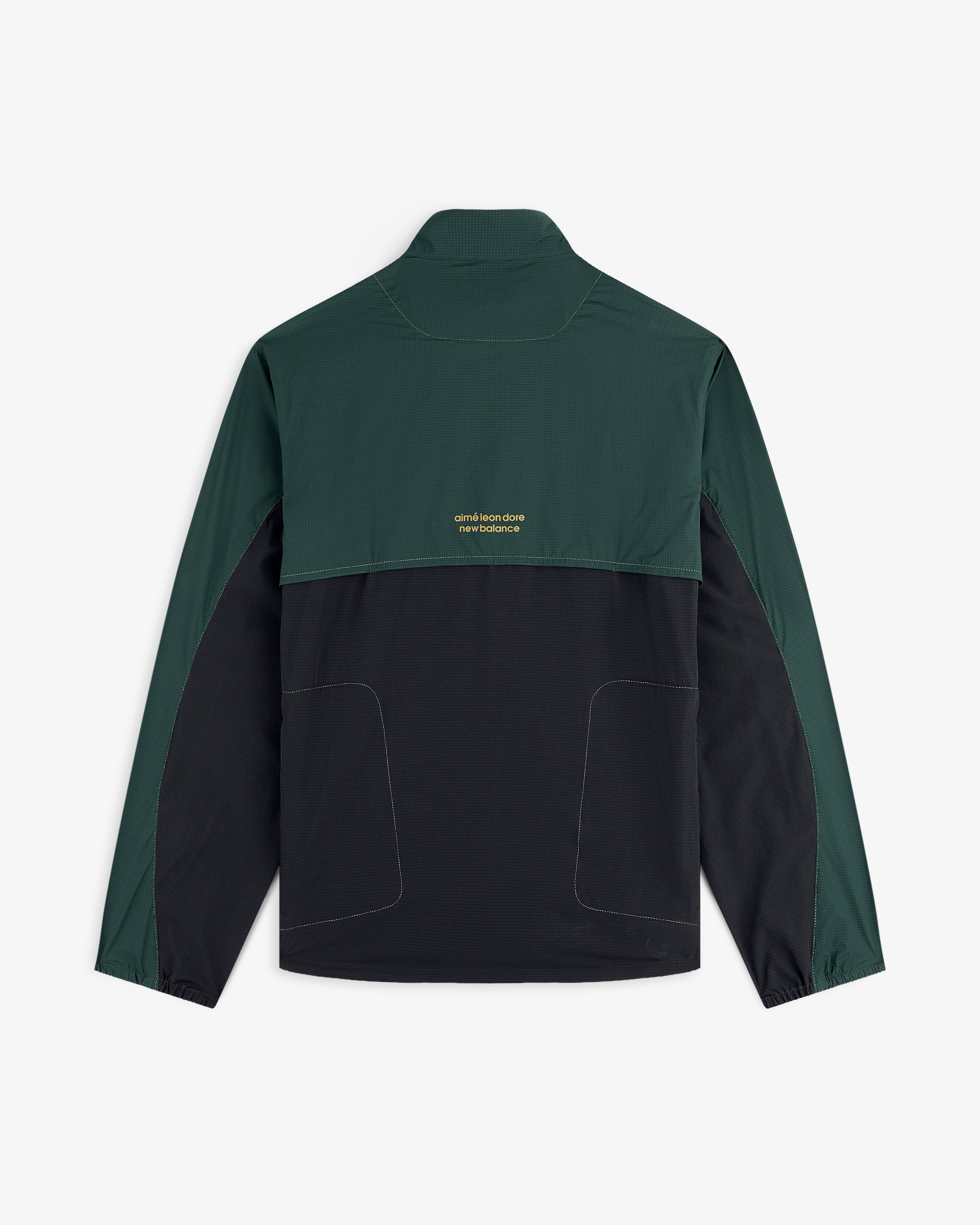 ALD / New Balance Performance Nylon Jacket in green and black with yellow back text, long sleeves, and high collar.