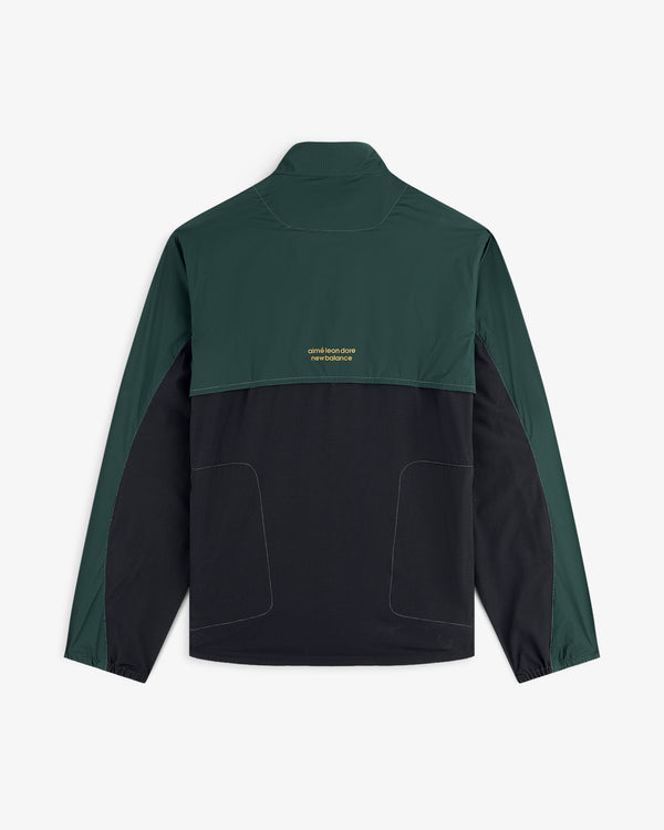 ALD / New Balance Performance Nylon Jacket in green and black with yellow back text, long sleeves, and high collar.