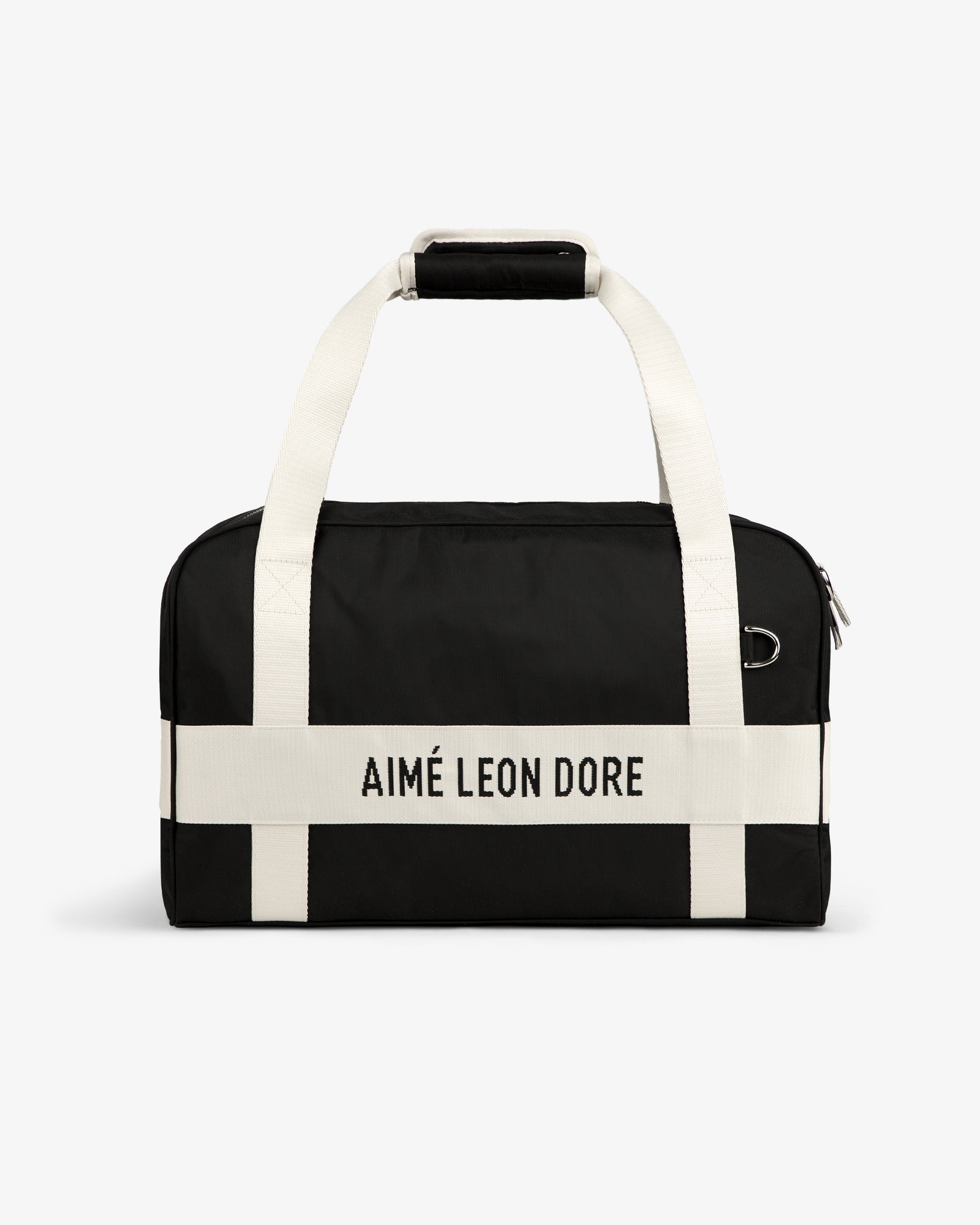 Nylon Duffle Bag in black with white handles and AIMÉ LEON DORE printed on a white front strap.