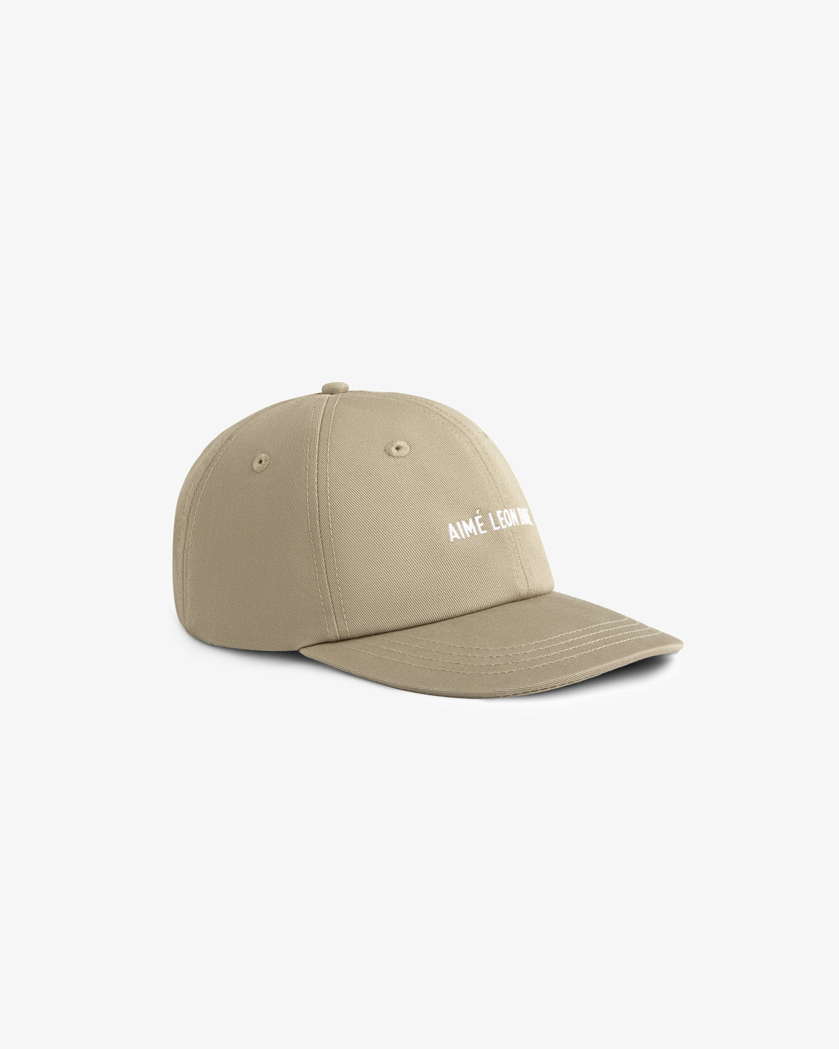 Beige Core Logo Hat with curved brim and small white AIMÉ LEON DORE text on front, shown on a white background.