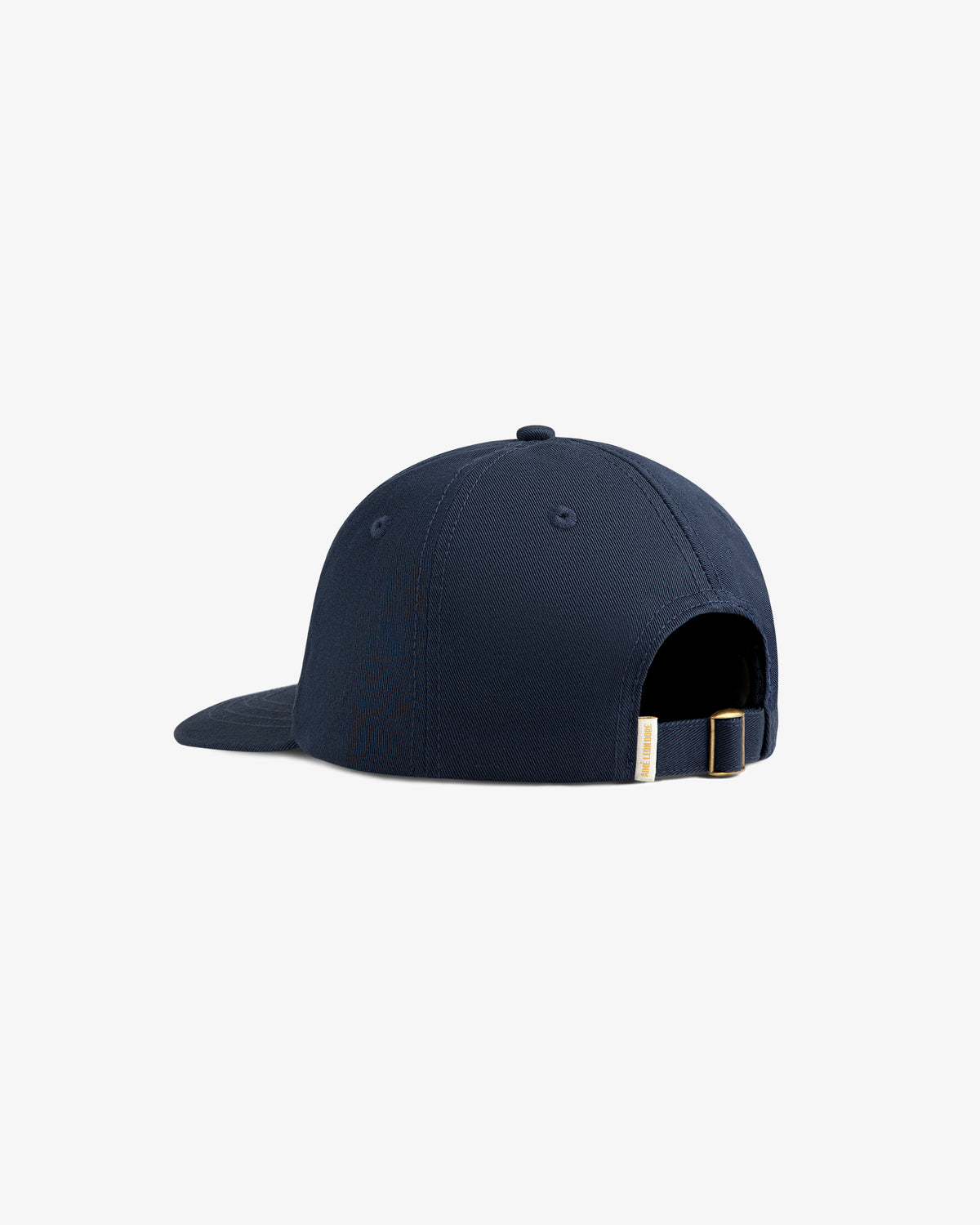 A Core Logo Hat in navy blue, shown from the back with an adjustable strap and metal buckle.