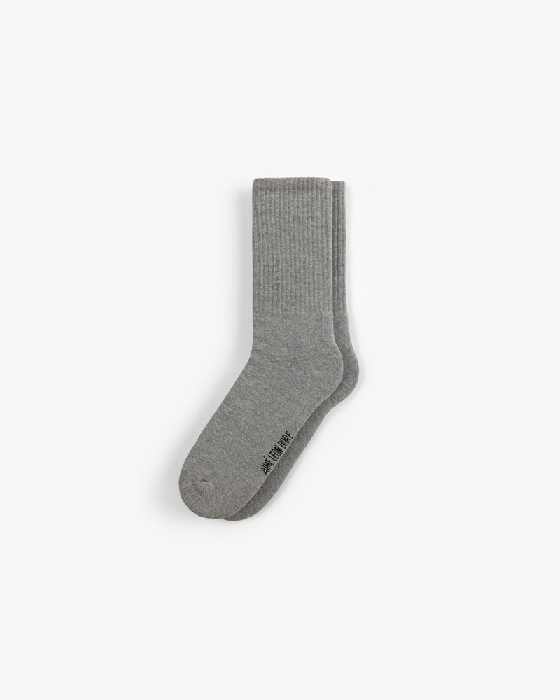 A Crew Sock 3-Pack in plain gray with ribbed cuffs, shown stacked together on a white background.
