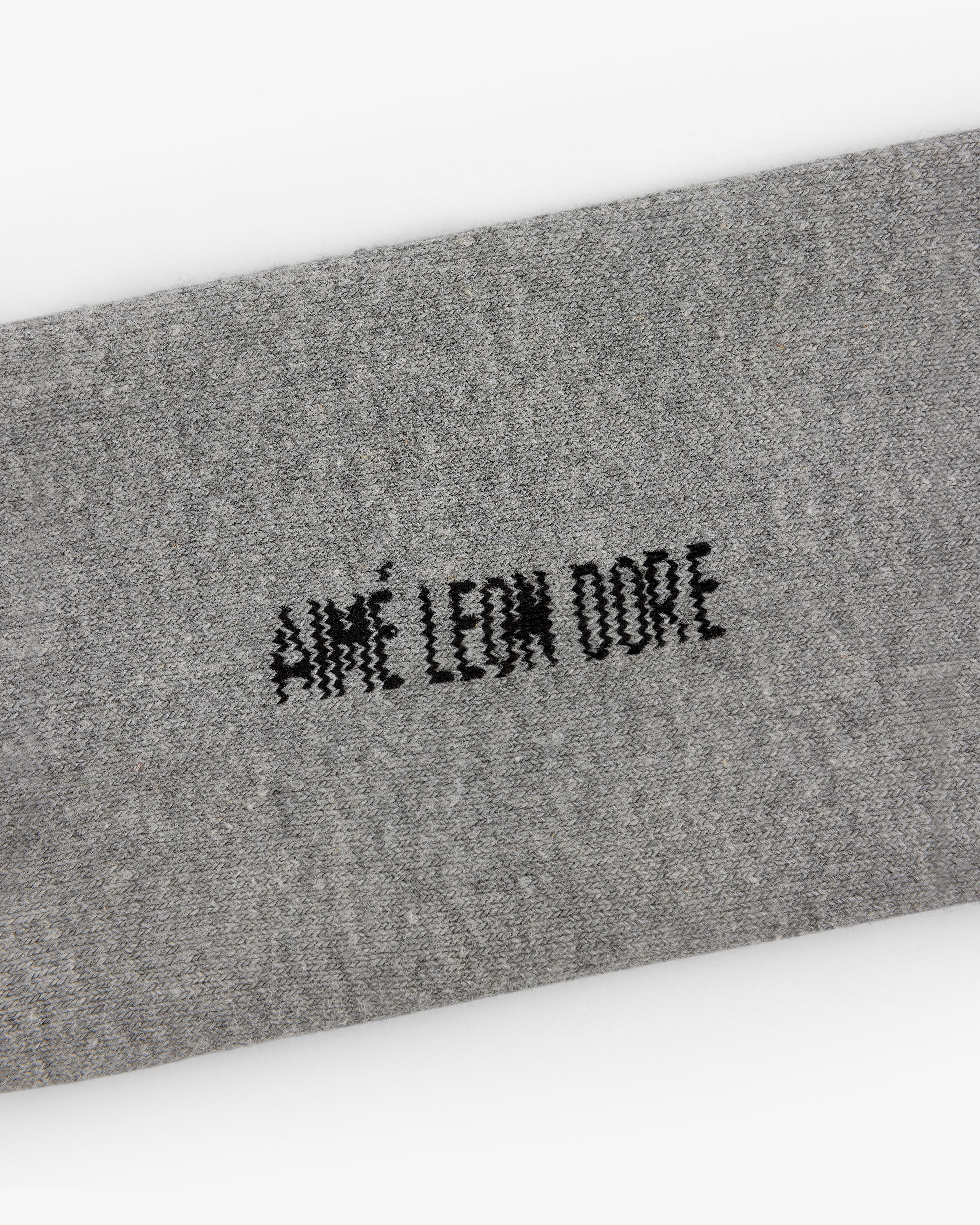 Gray Crew Sock 3-Pack with black AIMÉ LEON DORE stitching centered on the fabric.