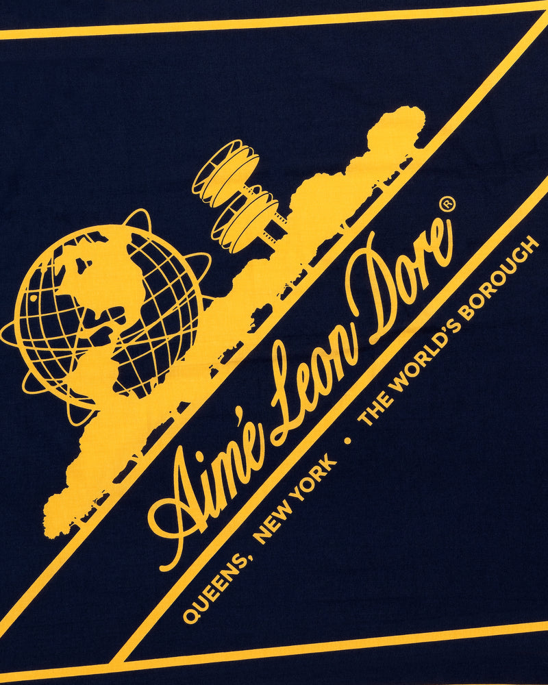 Yellow globe graphic and Queens skyline on navy Unisphere Bandana by Aimé Leon Dore, The Worlds Borough text.