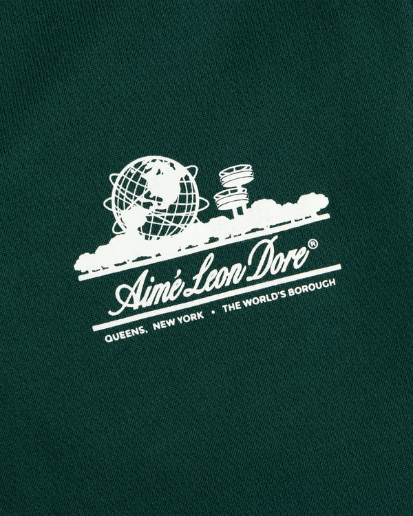 Dark green Unisphere Sweatpants featuring a white Aimé Leon Dore globe logo above text.