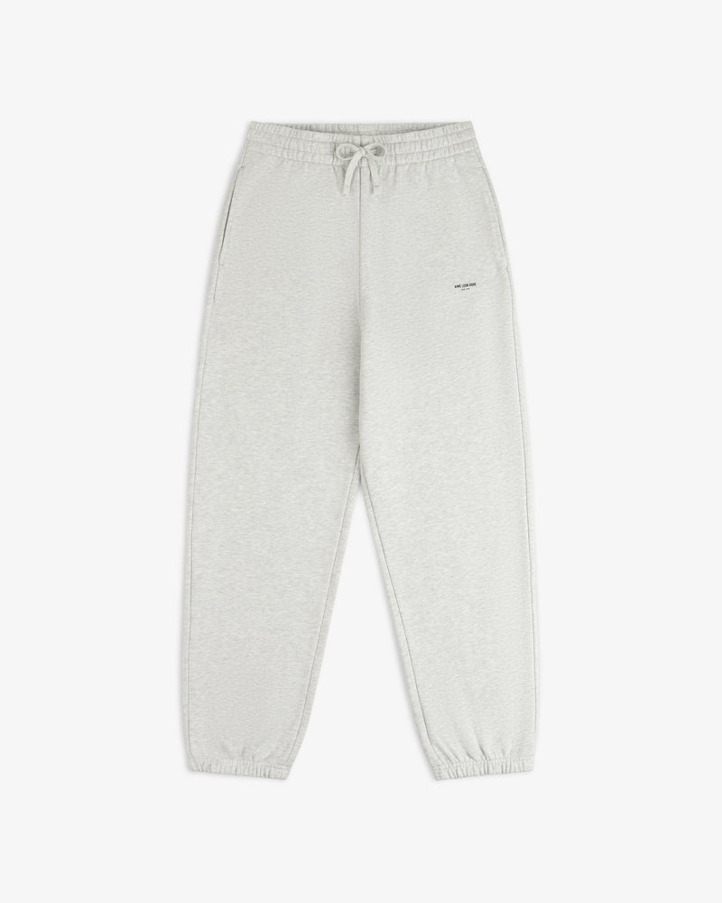 Light gray Micro Logo Sweatpants with drawstring waist, side pockets, and elastic cuffs on white background.