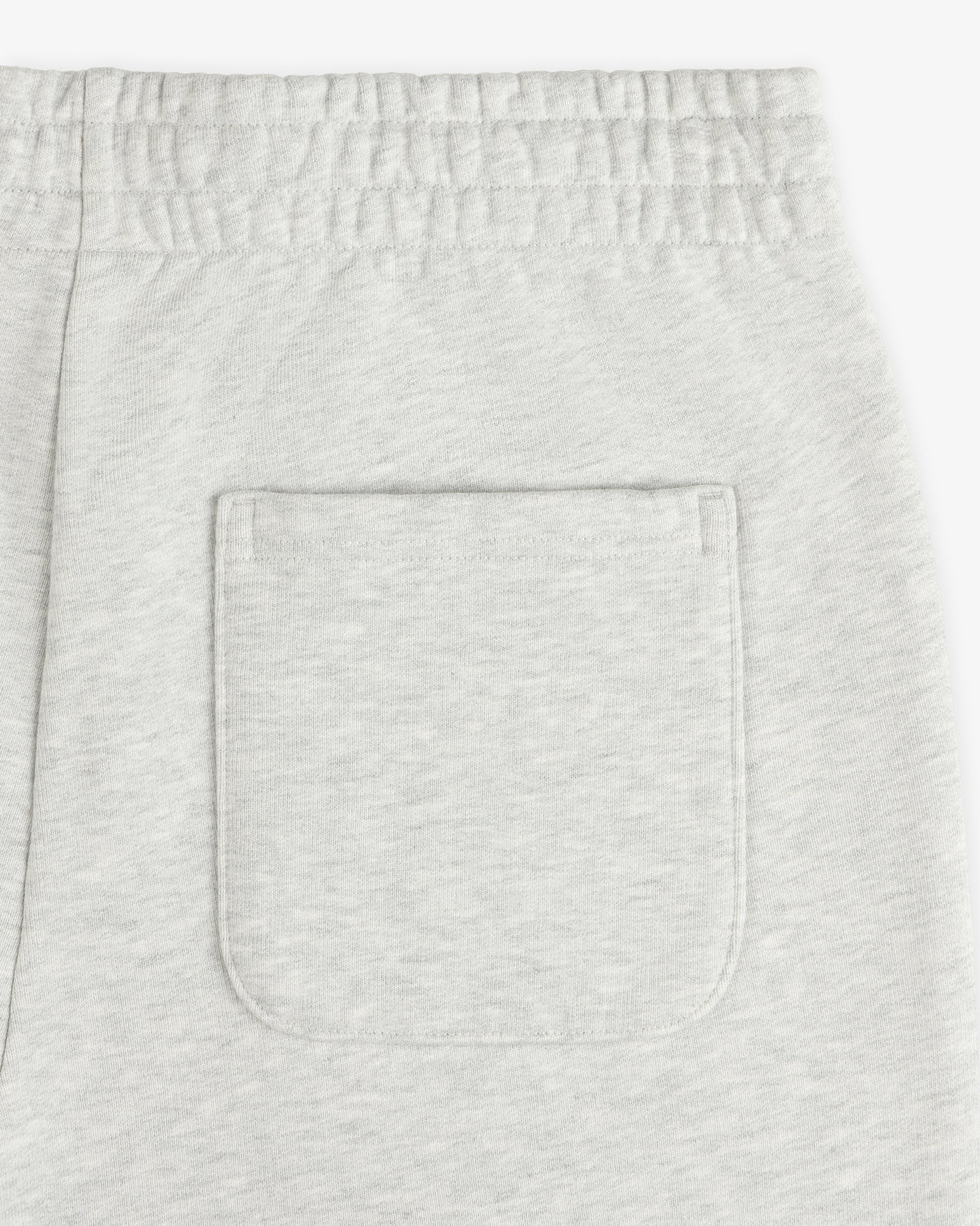 Micro Logo Sweatpants in light gray with an elastic waistband and a rectangular back patch pocket.