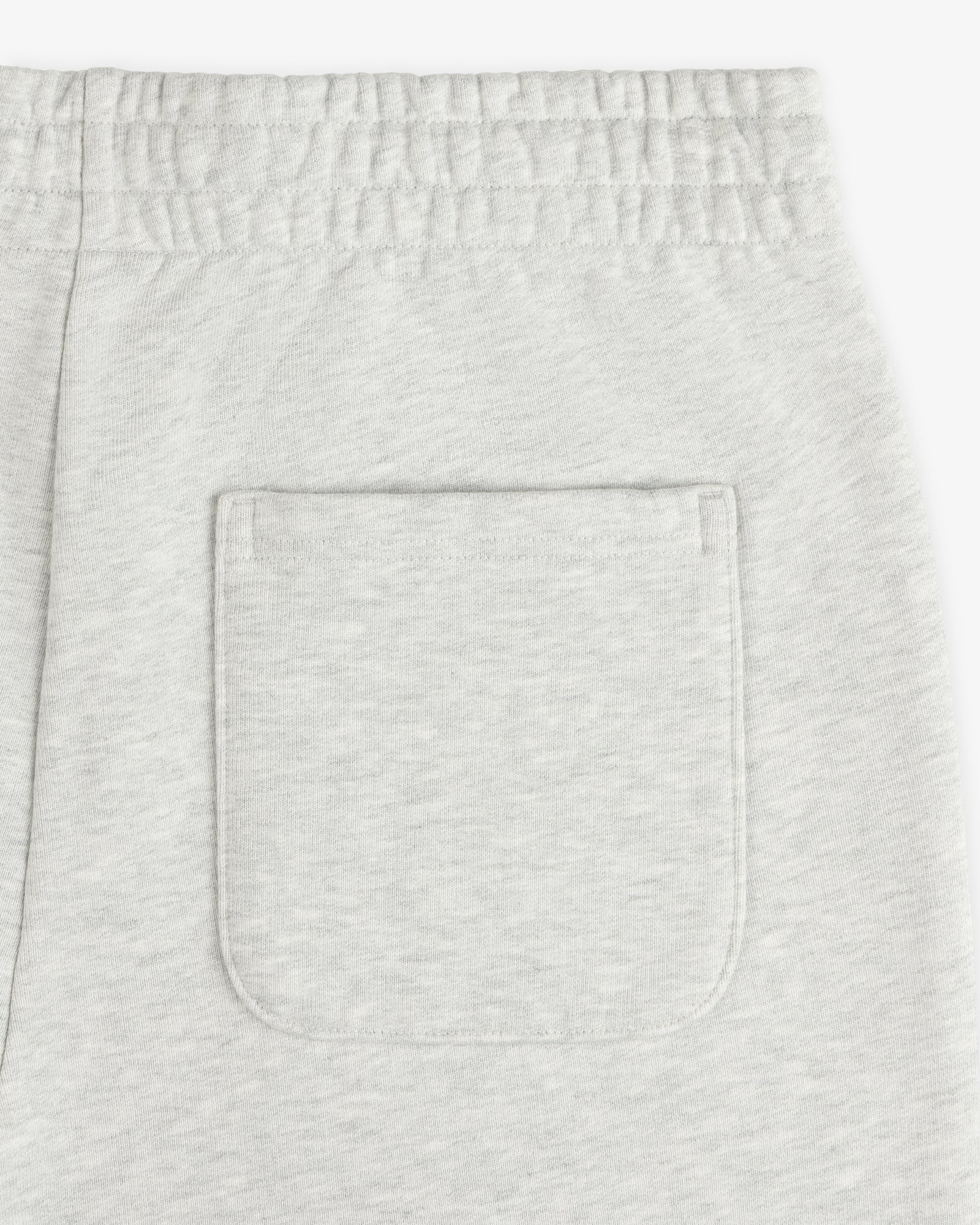 Micro Logo Sweatpants in light gray with an elastic waistband and a rectangular back patch pocket.