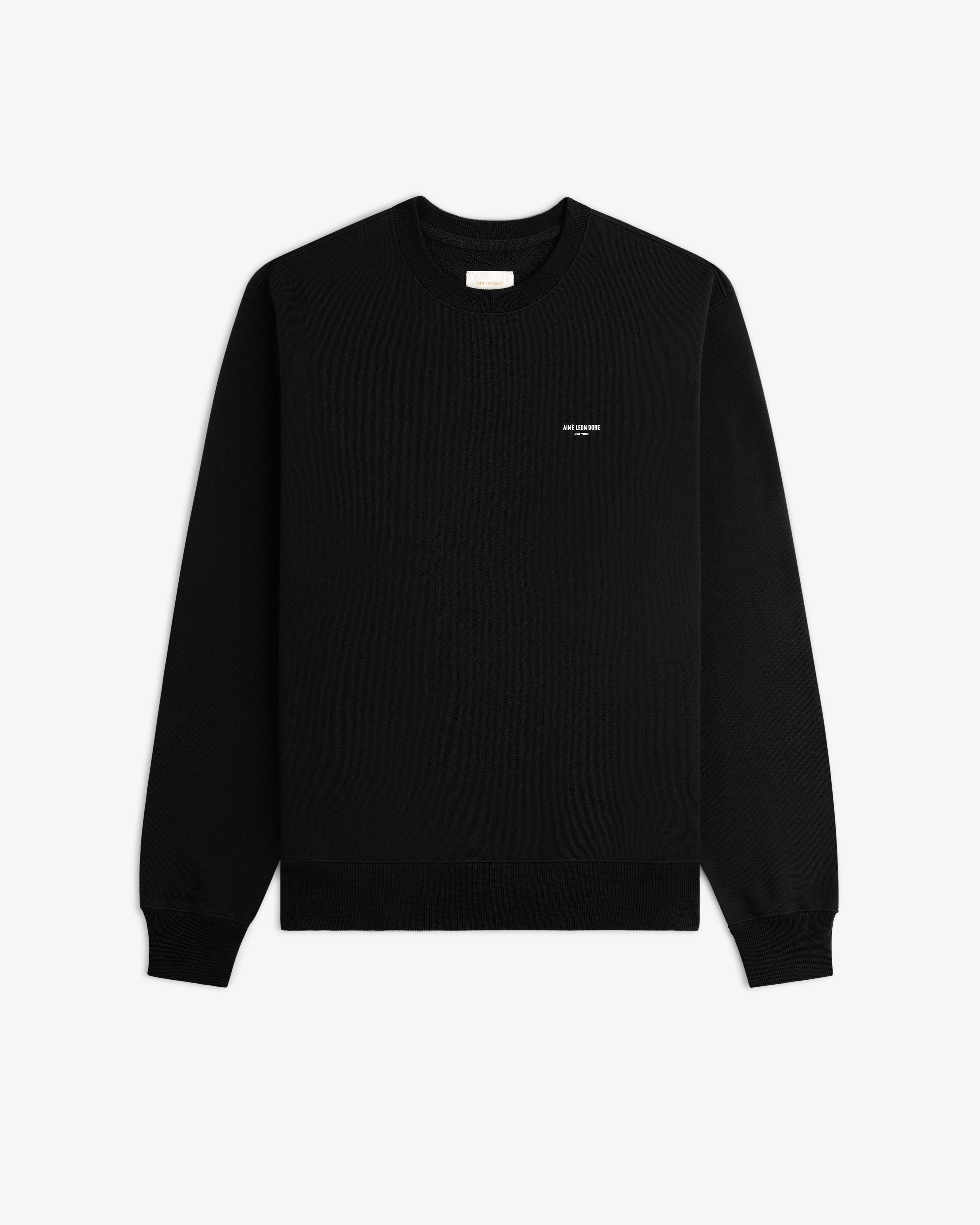 Black Micro Logo Crewneck Sweatshirt with small white chest text, shown flat on a white background.
