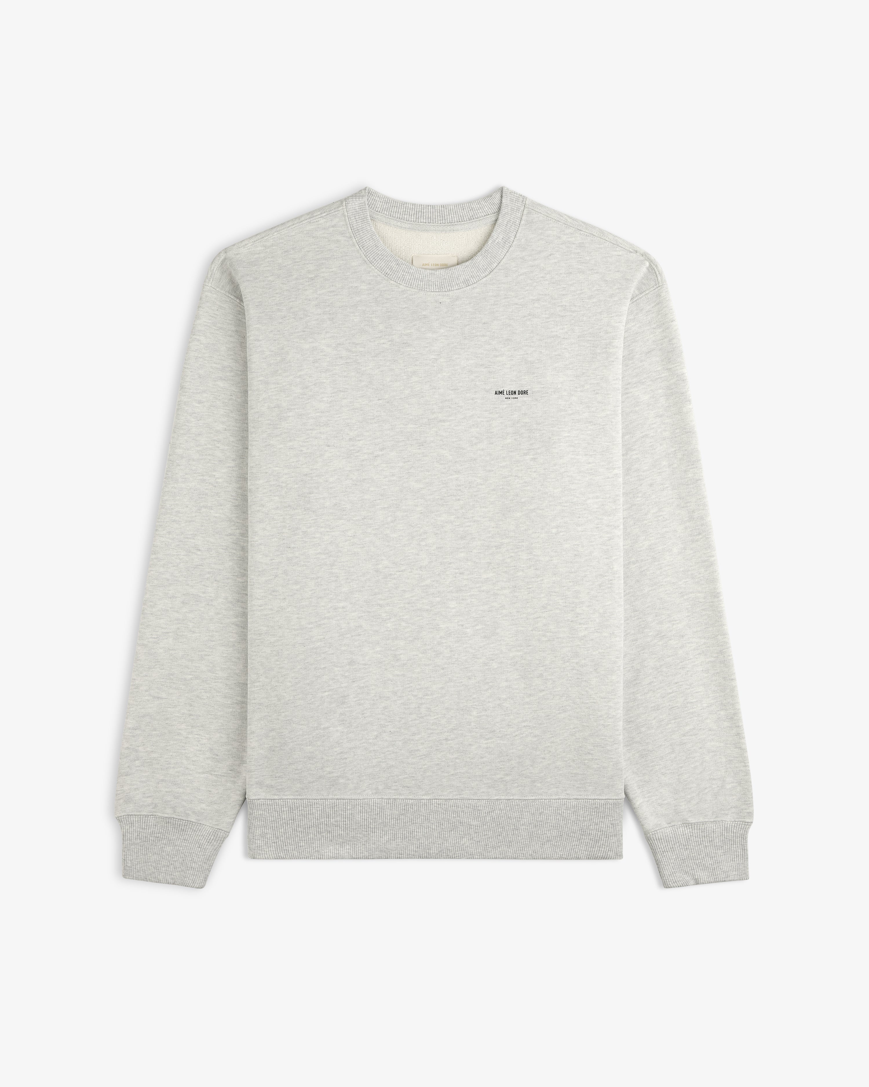 Light gray Micro Logo Crewneck Sweatshirt with subtle chest text, shown flat on a white background.