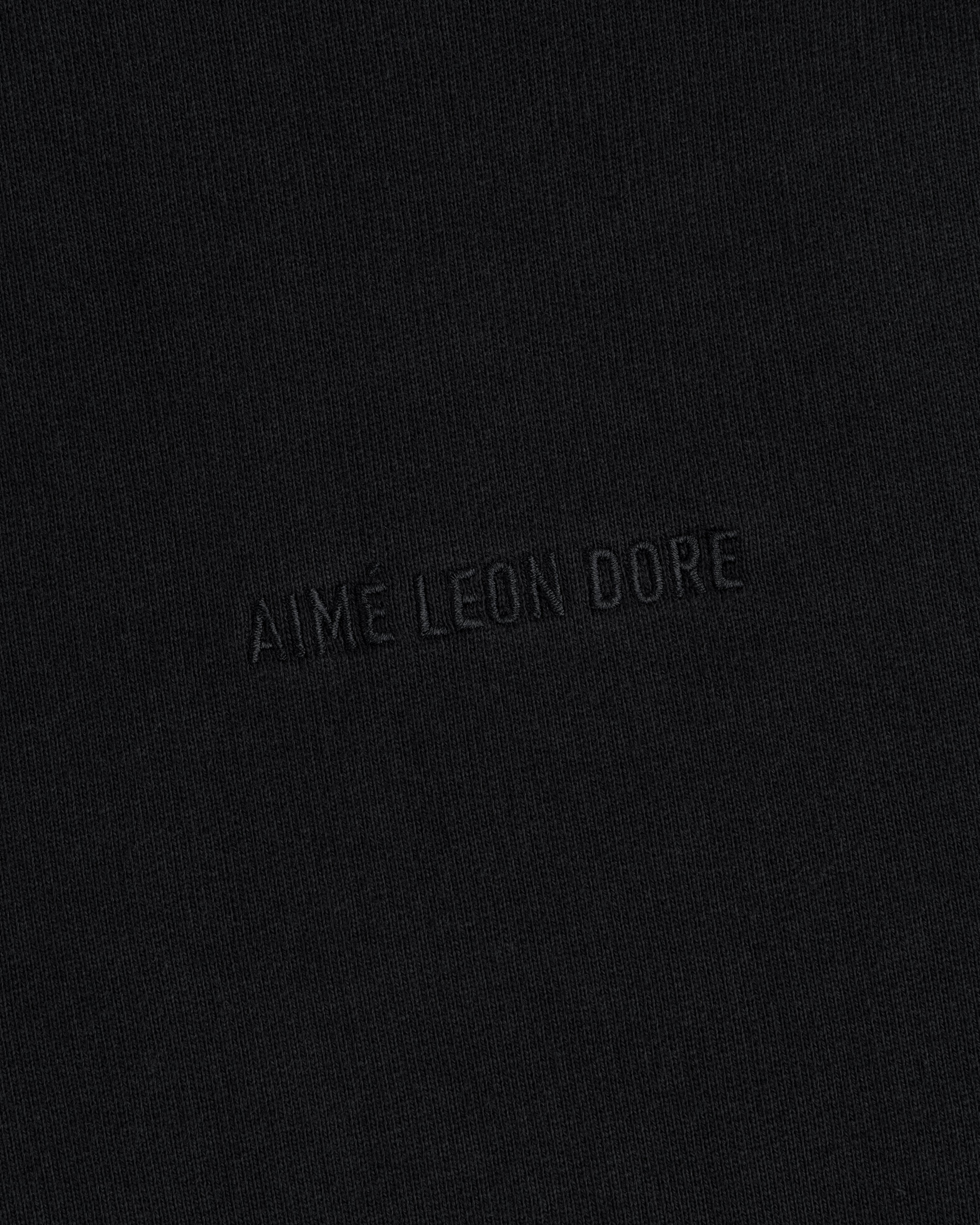 AIME LEON DORE Tonal Logo Crewneck Sweatshirt: black, minimalist design with subtle embossed branding.
