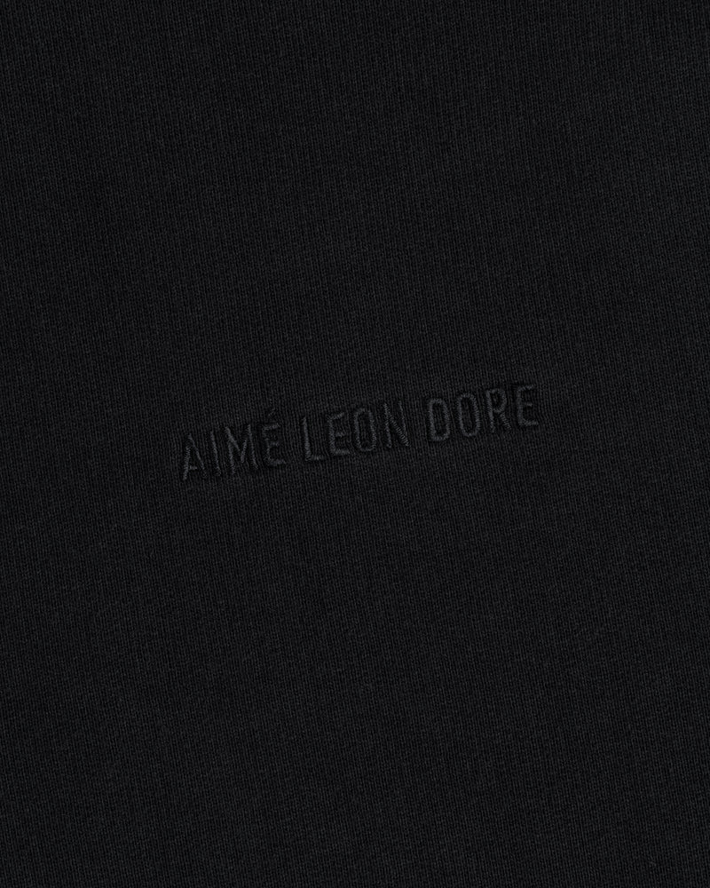 AIME LEON DORE Tonal Logo Crewneck Sweatshirt: black, minimalist design with subtle embossed branding.