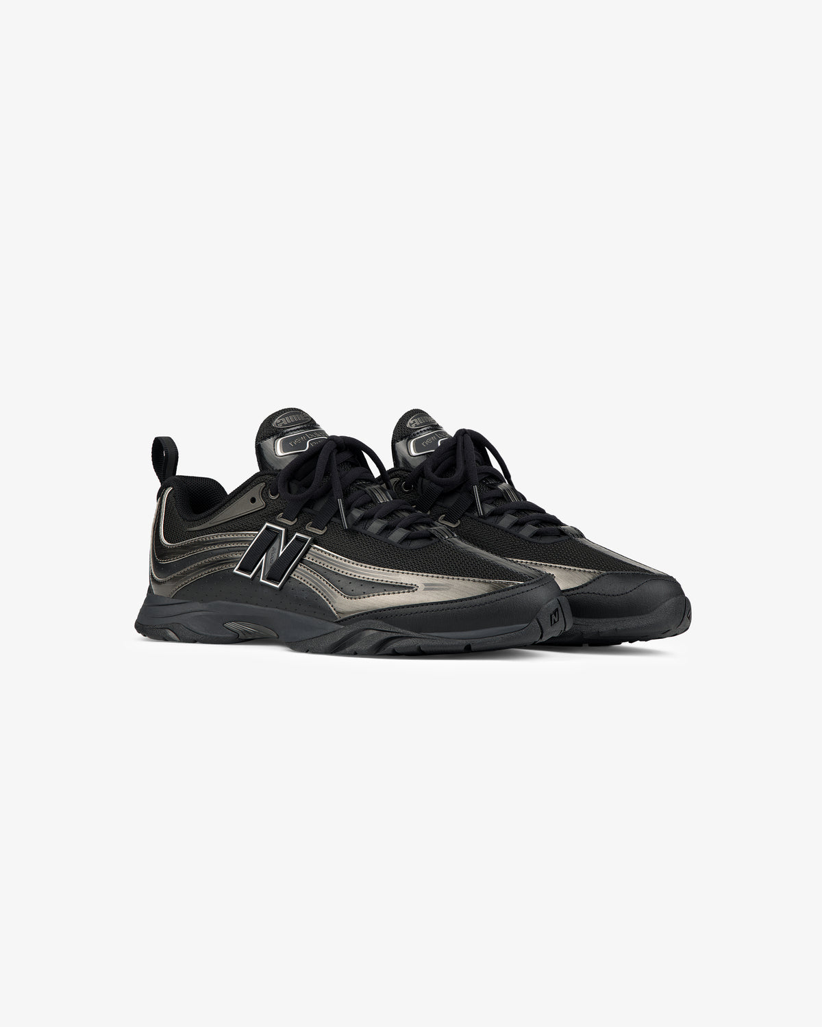 A pair of black and gray ALD / New Balance RC56 sneakers with laces, side logo, and chunky soles on a white background.