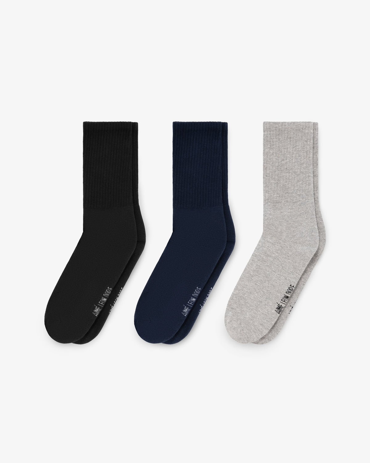 Crew Sock 3-Pack: black, navy blue, and light gray pairs displayed side by side on a white background.