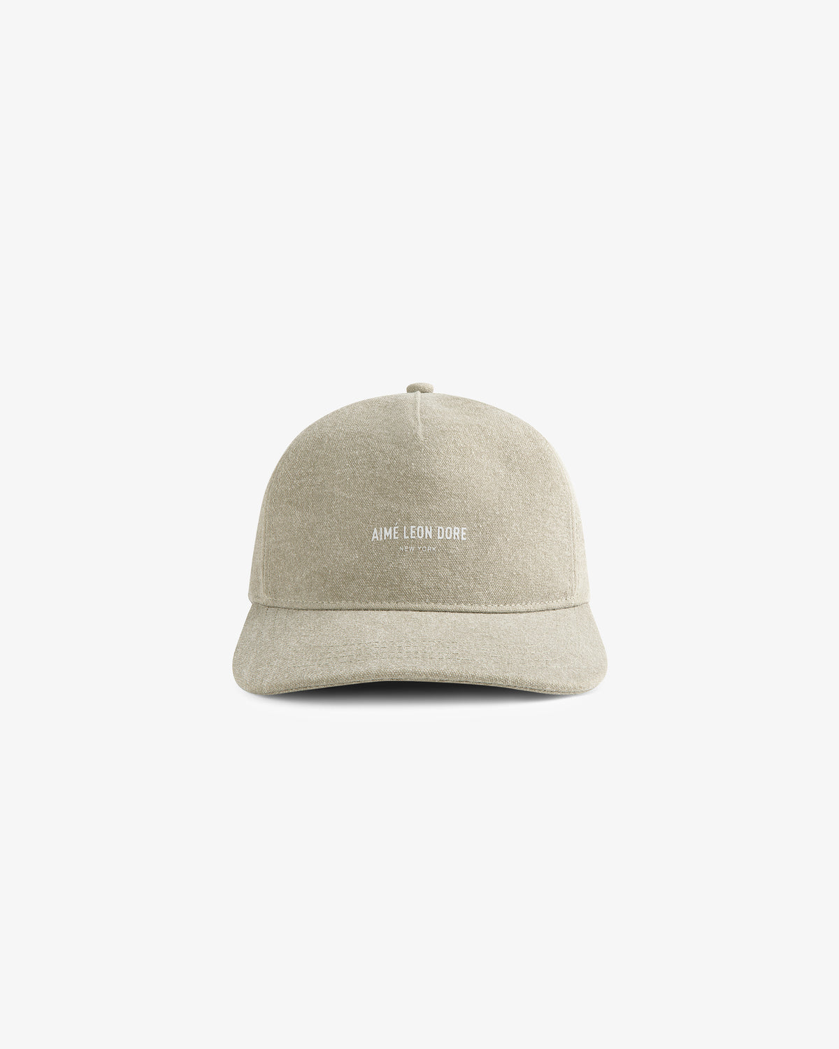 Light beige Micro Logo Hat with white AIME LEON DORE text on the front, shown against a plain white background.