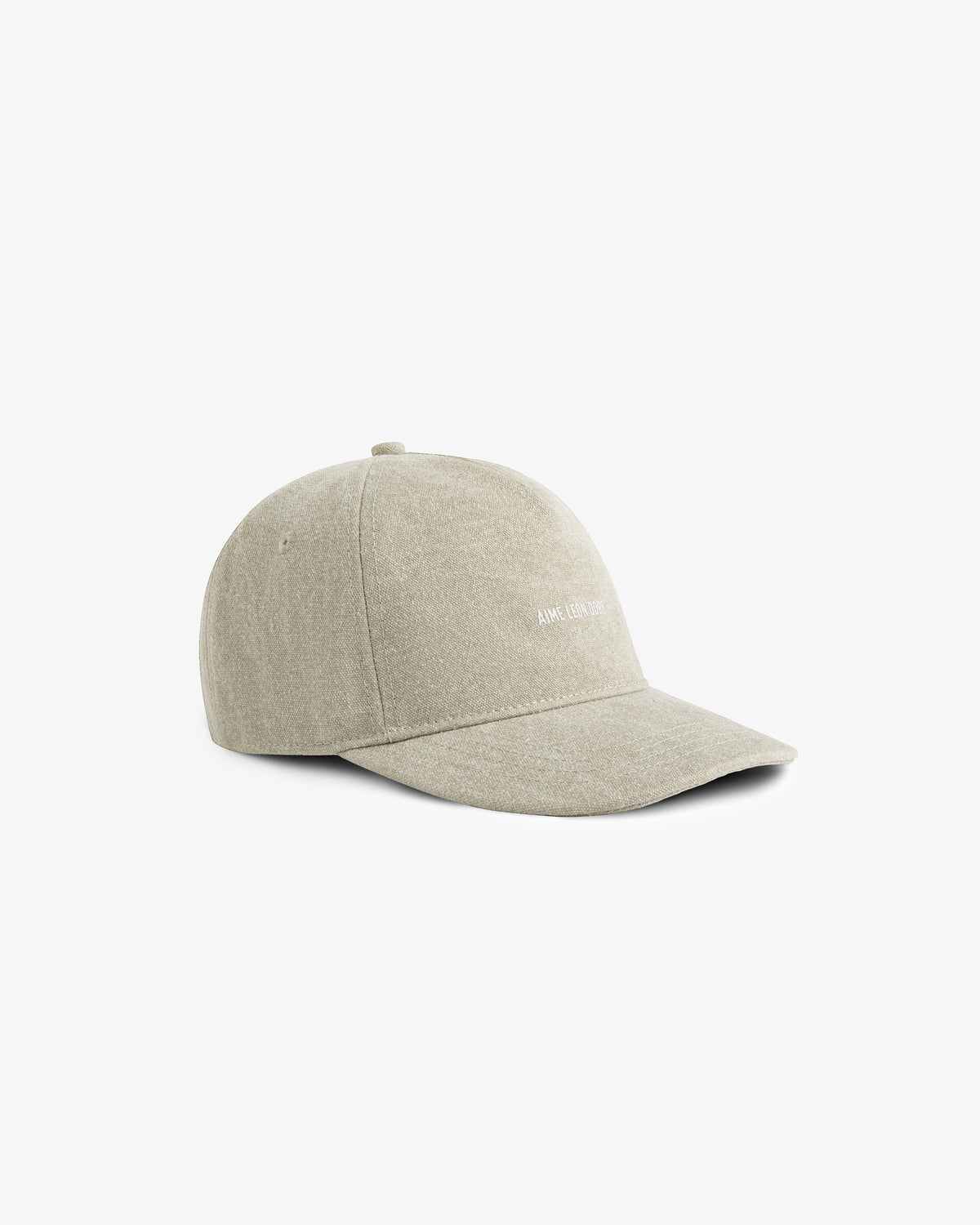 Micro Logo Hat in beige with a curved brim, shown on a plain white background.