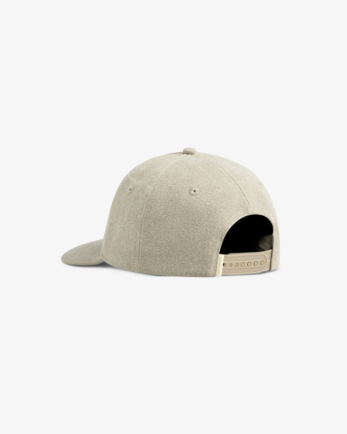 Micro Logo Hat in beige, shown from the back with adjustable strap and curved brim on a white background.