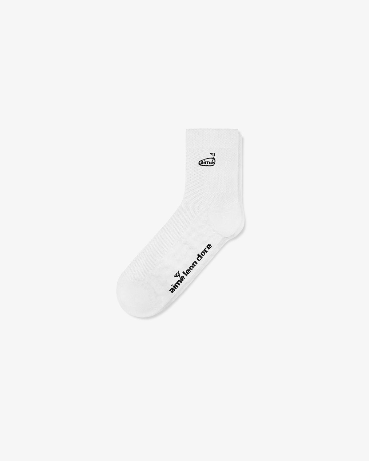 White ALD Golf Performance Ankle Sock with black text and logo near the cuff and along the side reads aimé leon dore.