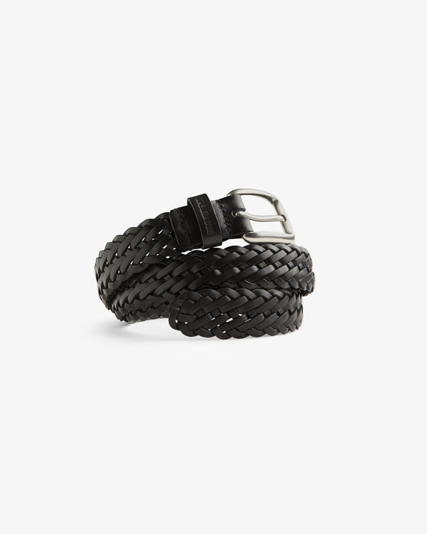 The Braided Leather Belt in black leather with a silver buckle, coiled on a white background.