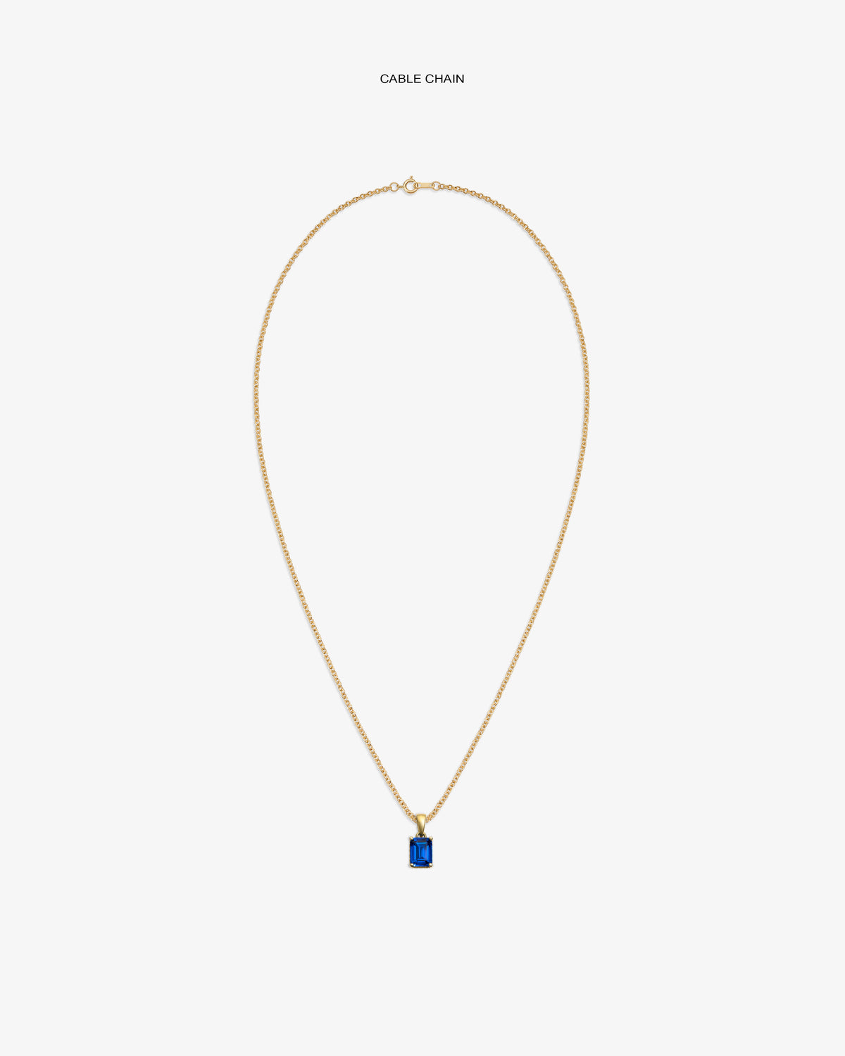14Kt Gold Gemstone Pendant with a blue stone on a cable chain, shown against a white background.