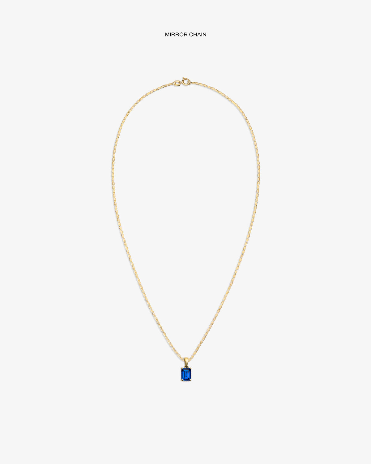 14Kt Gold Gemstone Pendant with blue rectangular stone, shown on a plain white background.