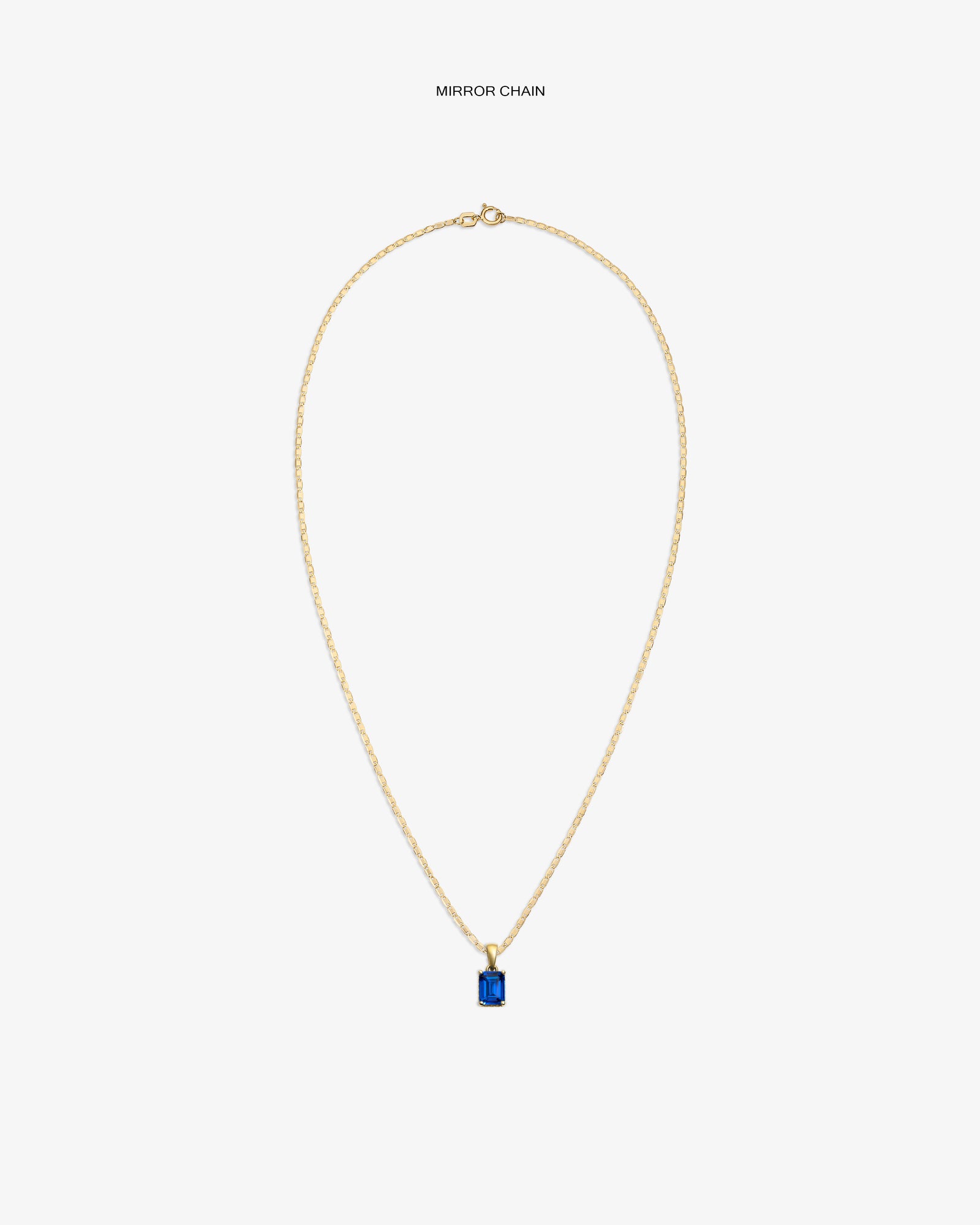 14Kt Gold Gemstone Pendant with blue rectangular stone, shown on a plain white background.