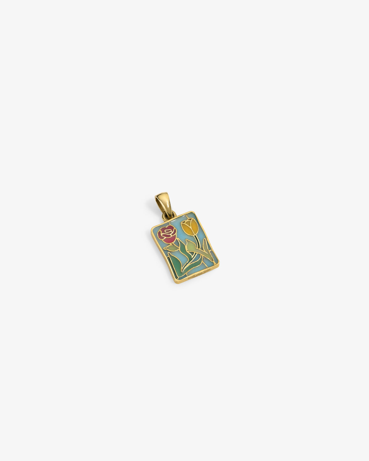 14Kt Gold Stained Glass Crest Pendant with rose and tulip on green, shown on a white surface.