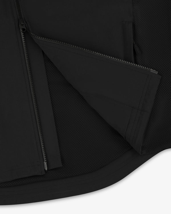 Close-up of ALD Golf Cordura Tips Jacket in black, showing unzipped section and inner mesh lining.